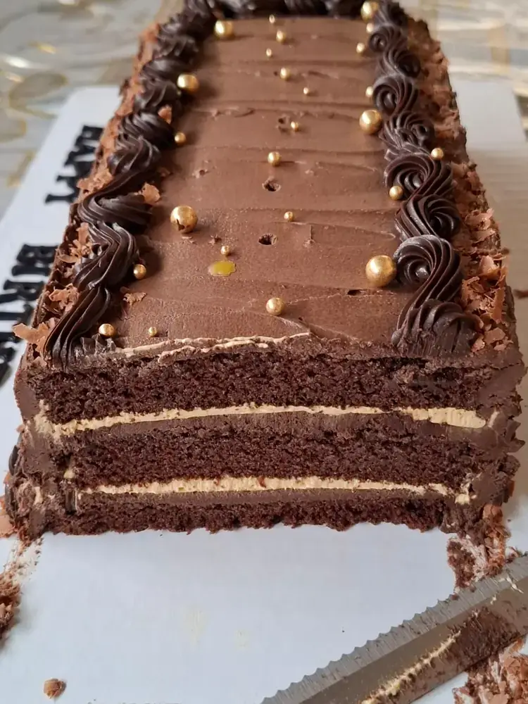 Chocolate layer celebration cake by Bilkis Cakes and Bakes