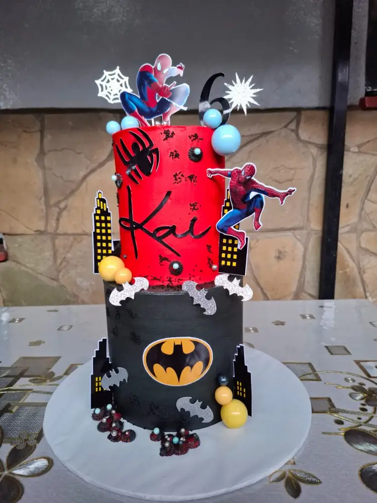 Superhero Two-Tier cake by Bilkis Cakes and Bakes