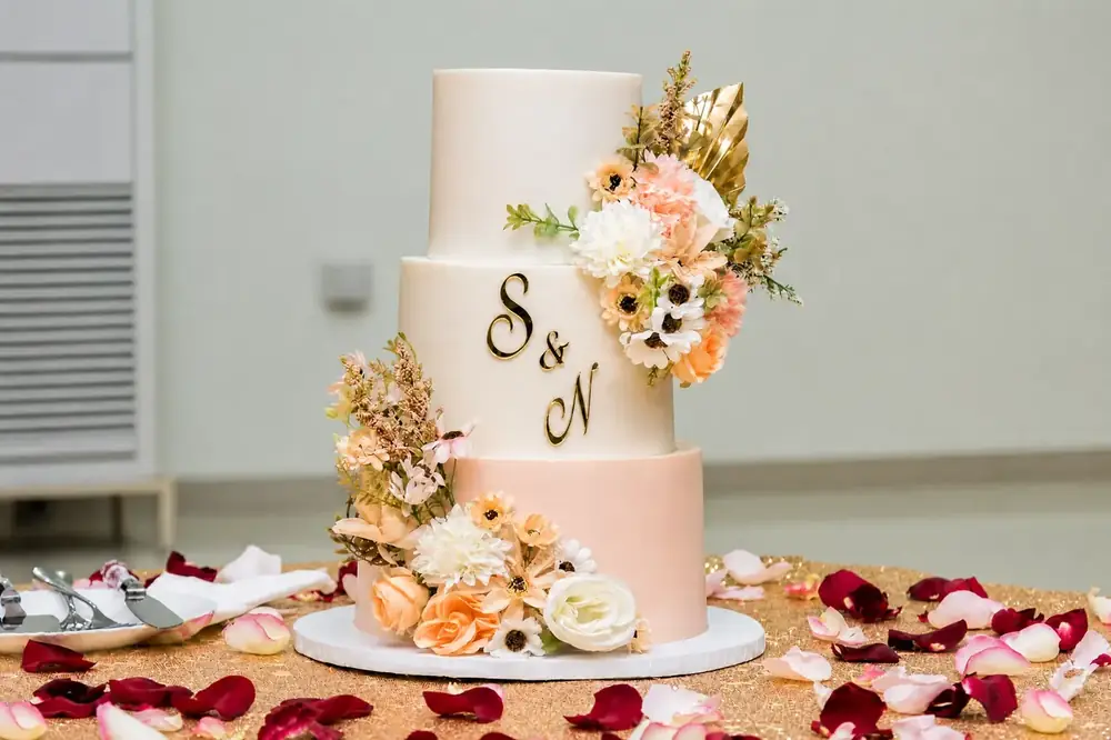 Three-Tier Blush & Ivory Floral cake by Bilkis Cakes and Bakes